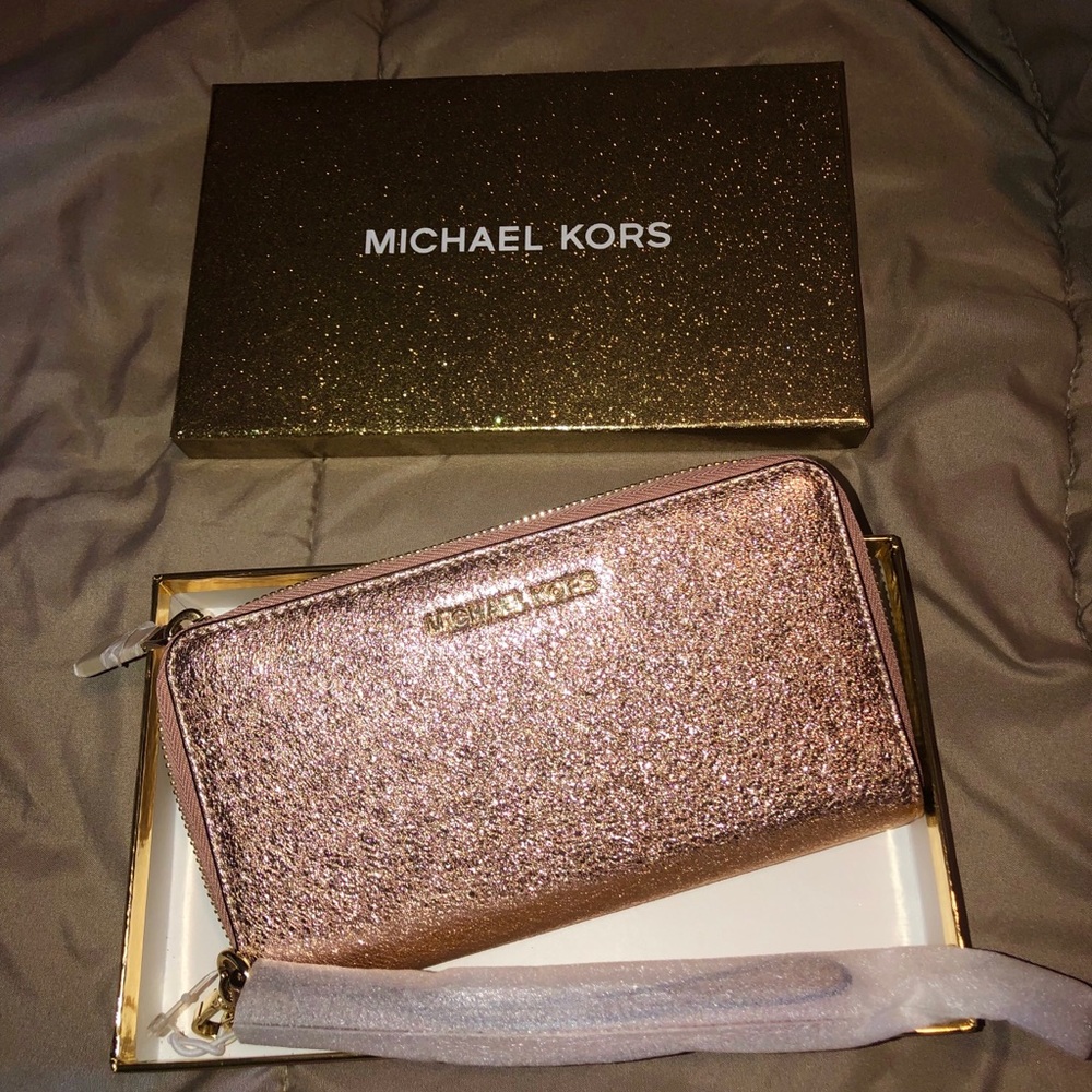 Michael Kors sparkly pink wallet.